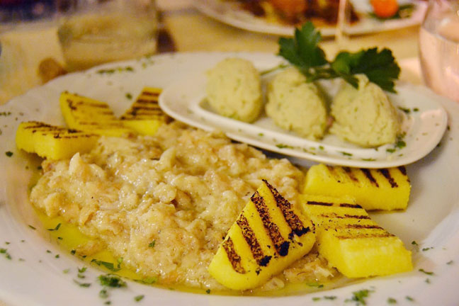 Baccala mantecato, dried cod mousse over polenta, a Venetian dish