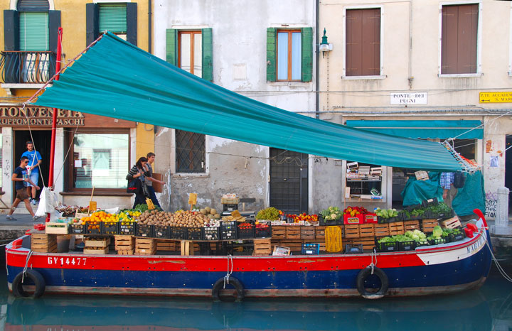 Boat filled with produce in Venice, Italy
