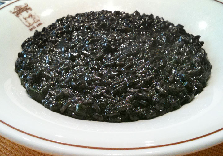 Venetian squid ink risotto, a Venice local food