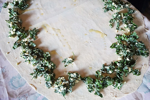 Cheese and greens filling for burek, or pita, uncooked in Bosnia.