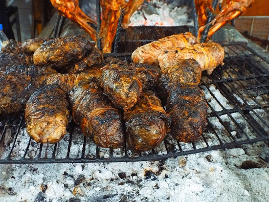 Grilling machitos, goat small intestines, on display at Mercado Hidalgo in Monterrey, Mexico.