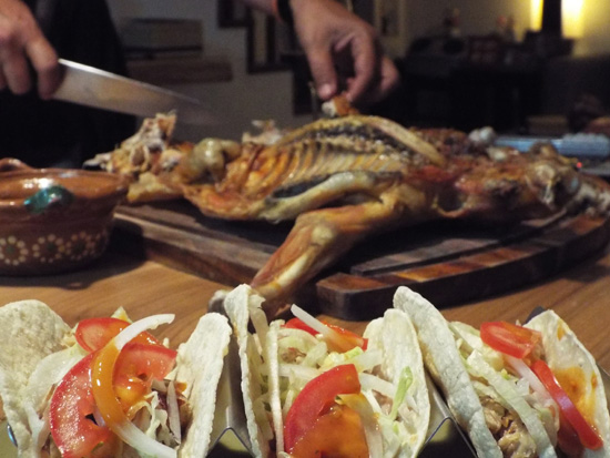 Cabrito, or roasted goat, being sliced for tacos in Monterrey, Mexico