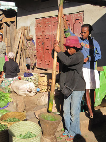 Pounding cassava for ravitoto in Madagascar