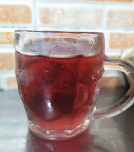 Glass mug of pink bubbly espumante wine in Porto, Portugal