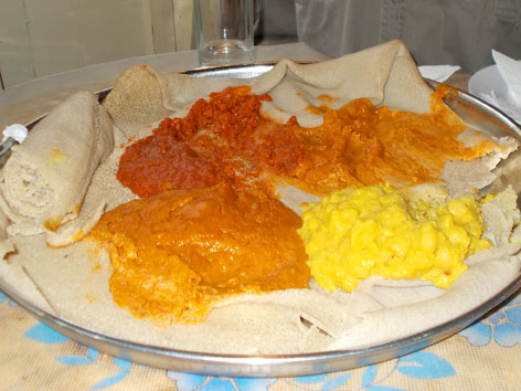 Shiro and misir wat over injera in Addis Ababa, Ethiopia