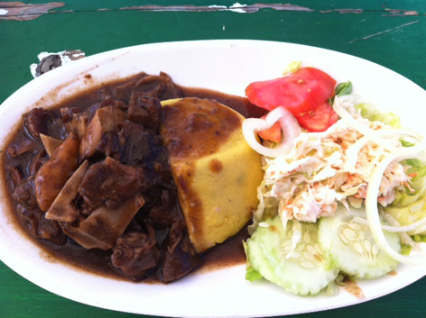 Goat water and fungee, a traditional dish in Antigua, the Caribbean