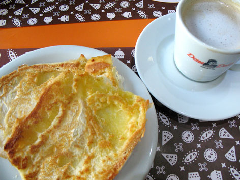 Pao na chapa e media, a traditional breakfast in Sao Paulo, Brazil