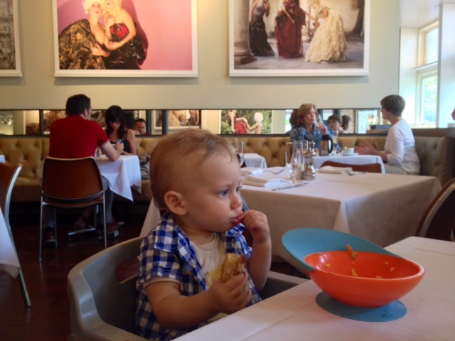 Baby eating in a restaurant