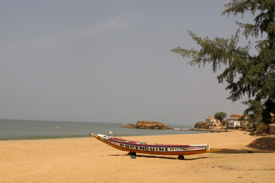 Pirogue on a beach in Popenguine, Senegal