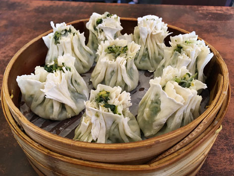 Shaomai dumplings in a bamboo steamer from a Beijing restaurant. 