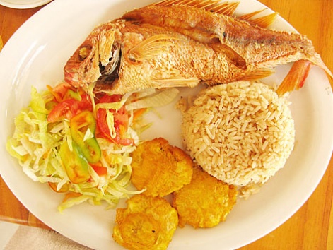 Arroz con coco with fresh fish in Cartagena, Colombia