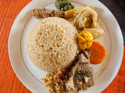 A plate of ceebu jën from Le Pointe E in Dakar, Senegal.