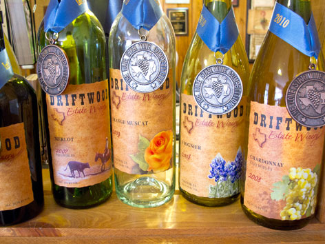 Driftwood Estate Winery wine bottles in Texas.