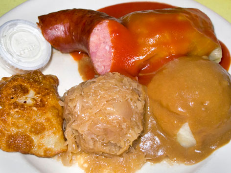 Polish food with stuffed cabbage, pierogi, and kielbasa from Polish Village Cafe in Detroit. 