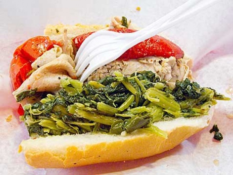 A roast pork sandwich with broccoli rabe from DiNic's in Philadelphia.