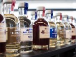 A shelf display of local Tasmanian whiskies and gin in Hobart.