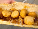 A sandwich of accara from a street stall in Dakar, Senegal.