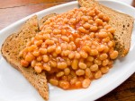 A plate of beans on toast from Greenfields Sandwich Emporium & Café in London, England.