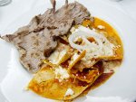 Chilaquiles and tasajo from Oaxaca's Casa de la Abuela.