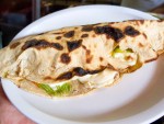 Empanada con flor de calabaza y quesillo at La Güerita in Oaxaca, Mexico.