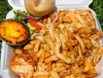 Portuguese chicken, fries, salad, and egg tart from Romados in Montreal, Quebec