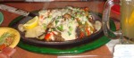 Queso a la Parrila with Beef and Chicken Fajitas